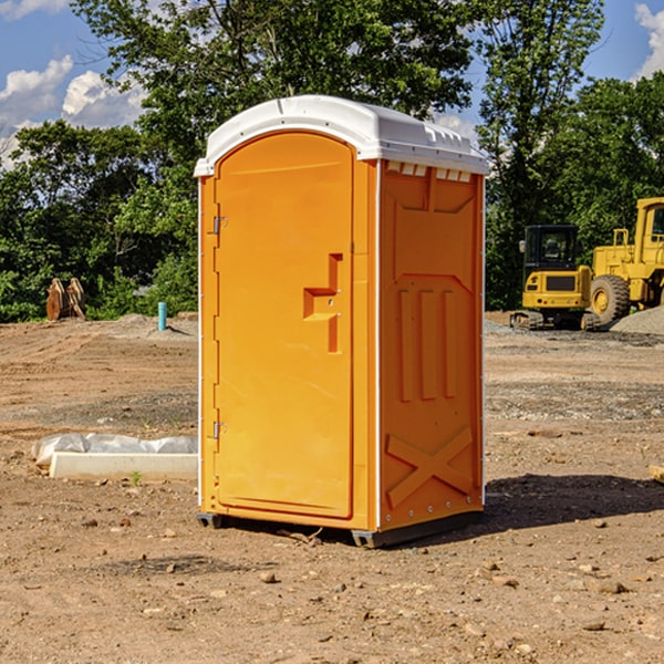 how often are the portable restrooms cleaned and serviced during a rental period in Queen City